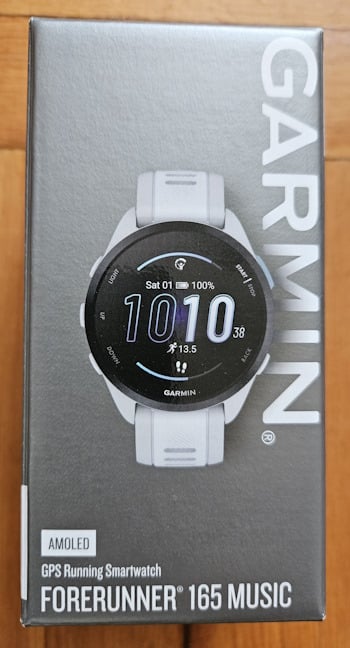 Garmin Forerunner 165 Music comes in a gray cardboard box