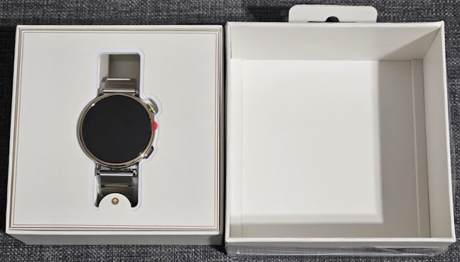 You see the watch as soon as you open its box