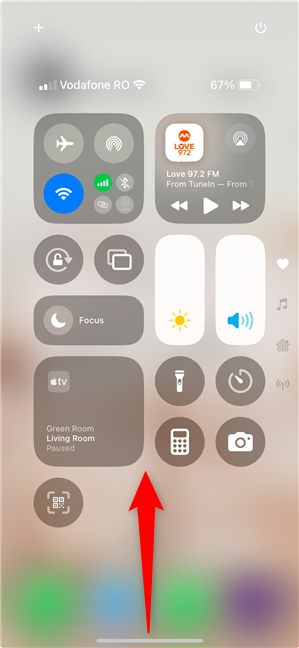 Swipe up from the bottom of the screen close the Control Center