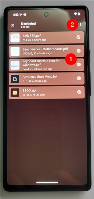 Select multiple files and tap the three-dot button in the top-right corner