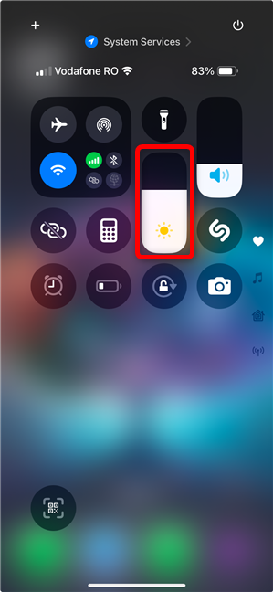 Touch and hold the Brightness slider