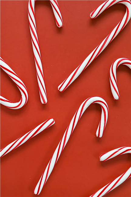 White and red candy canes by Deidre Schlabs