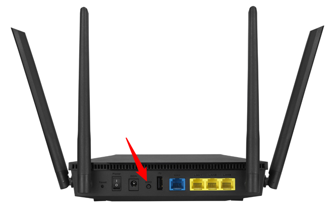 The location of the WPS button on an ASUS router